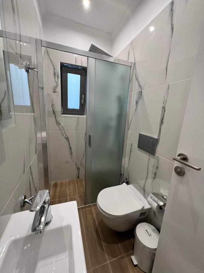 Atlantis Apartments Артемида Екстериор снимка